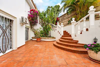 Private patio with tropical garden