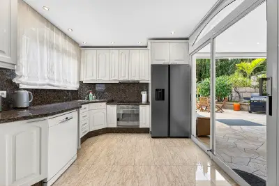 Fully equipped kitchen with garden access