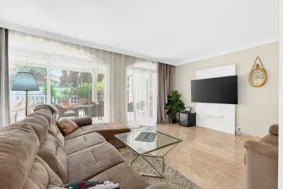 Bright living room with garden access