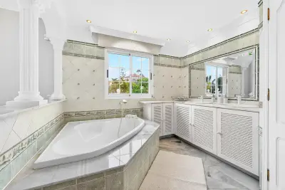 Bathroom with bathtub and natural light
