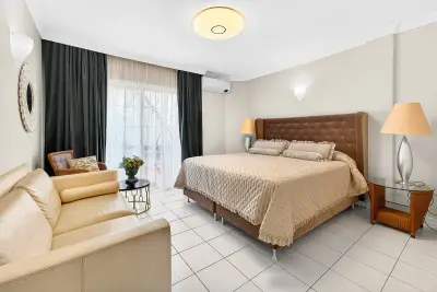 Spacious bedroom with lounge area