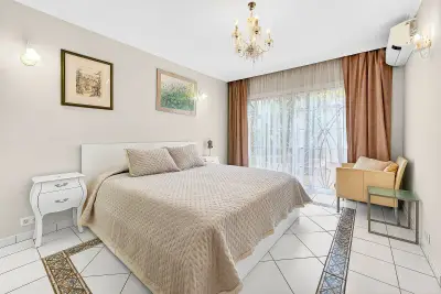 Bright bedroom with built-in wardrobes