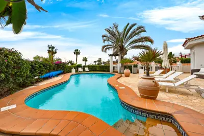 Private heated pool and sun loungers