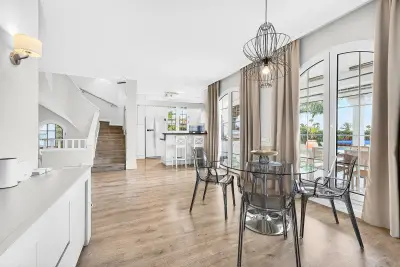 Bright indoor dining area with terrace access