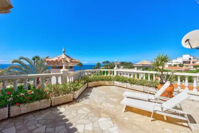 Private ocean-view terrace at sunset